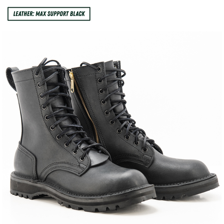 A pair of black leather lace-up combat boots with side zippers and a gold zipper pull, shown on a white background with a text label in the top left corner.