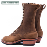 A pair of Nick's mid-calf lace-up boots in a weathered brown leather, shown from a side profile view against a white background. A text label in the top-left corner reads 'LEATHER: WEATHERSHIELD BROWN'.