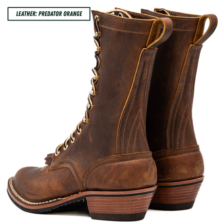 A brown leather lace-up boot shown in side profile on a white background, with a text label in the top-left corner that reads 'LEATHER: PREDATOR ORANGE'.
