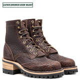 A pair of dark brown textured leather lace-up boots with a chunky layered wooden heel and black lug sole, shown on a white background with a text label in the top left corner.