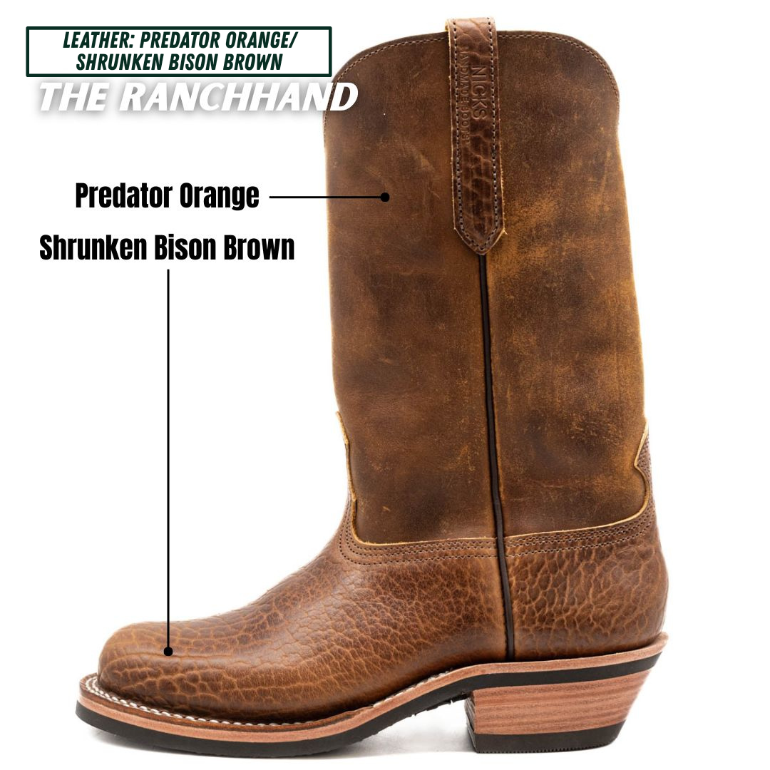 A brown leather cowboy boot shown on a white background with text labels pointing to the material color options: Predator Orange and Shrunken Bison Brown.