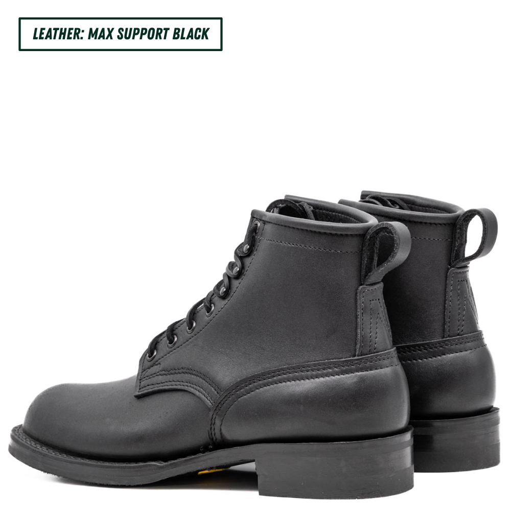 A pair of black leather lace-up ankle boots shown from a side profile view on a white background, with a text label in the top-left corner that reads 'LEATHER: MAX SUPPORT BLACK'.