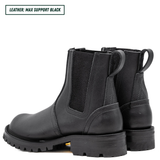Blackout Chelsea boots showing back profile and heel stack. Top left reads 'LEATHER: MAX SUPPORT BLACK'.