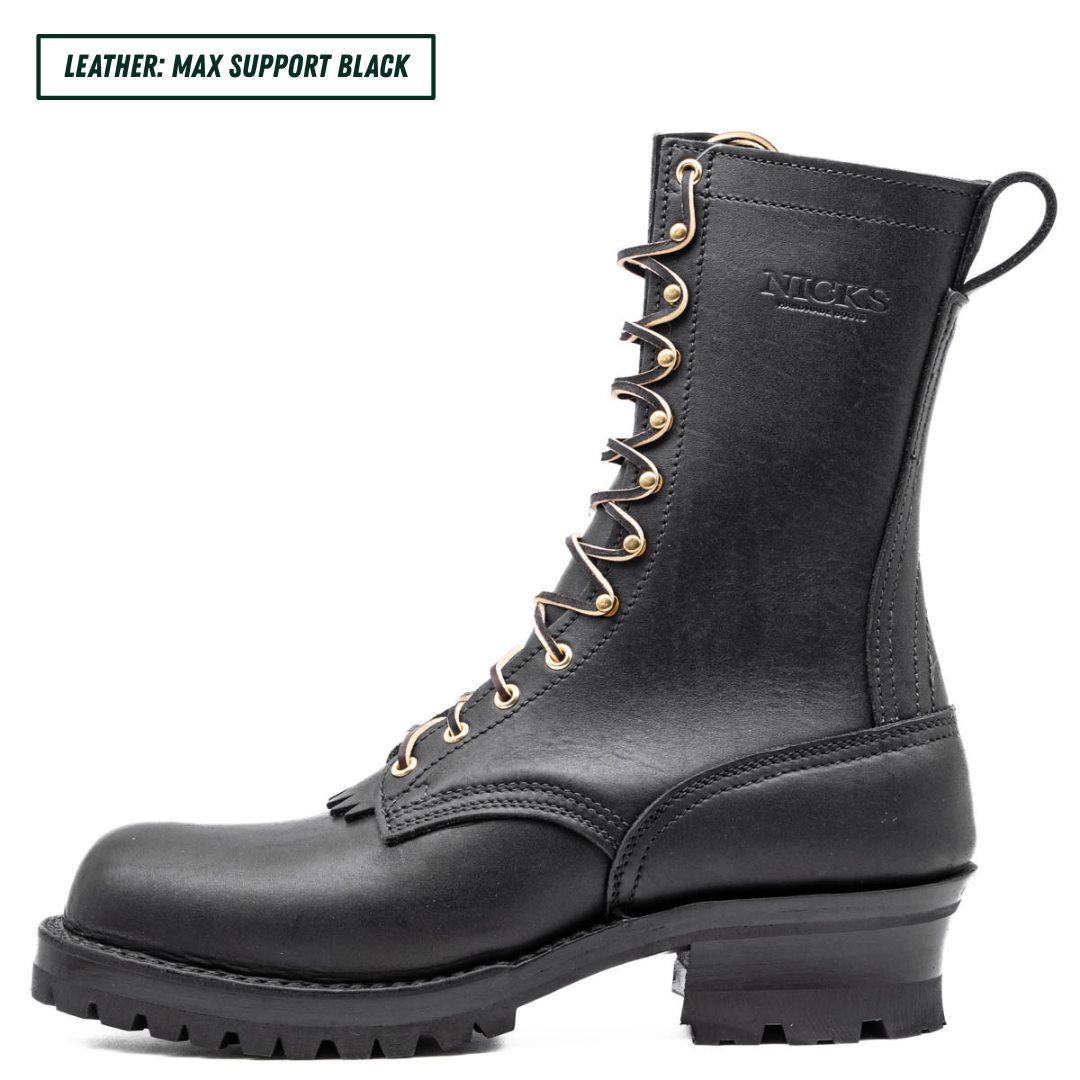 A black leather high-top work boot with gold-tone eyelets and laces, shown in a side profile on a white background. A text label in the top-left corner reads 'LEATHER: MAX SUPPORT BLACK'.
