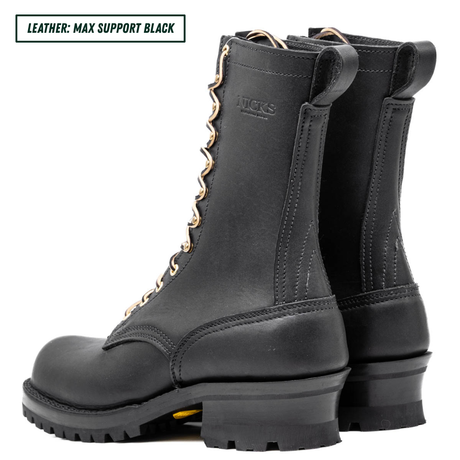 A pair of black leather lace-up boots shown from the side and back on a white background, with a text label in the top-left corner that reads 'LEATHER: MAX SUPPORT BLACK'. The boots feature a thick lug sole, a pull tab at the heel, and leather laces.
