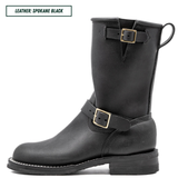 A black leather mid-calf boot with gold-tone buckle details, shown in a side profile on a white background. A text label in the top-left corner reads 'LEATHER: SPOKANE BLACK'.