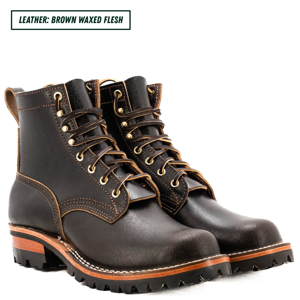 A pair of dark brown waxed leather lace-up boots with gold-toned metal eyelets and white contrast stitching, shown on a white background with a text label at the top reading 'LEATHER: BROWN WAXED FLESH'.