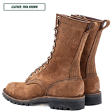 A pair of mid-calf lace-up boots in brown suede, shown from a three-quarter angle on a white background. A text label in the top left corner reads 'LEATHER: 1964 BROWN'.
