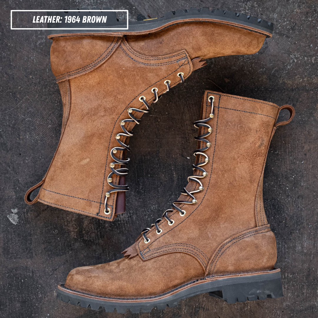 A pair of rugged lace-up work boots in textured brown leather, shown from multiple angles on a dark textured background. A text overlay in the top left reads 'LEATHER: 1964 BROWN'.