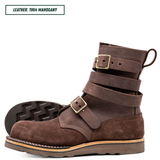 A pair of dark brown suede and leather ankle boots with buckle straps, shown on a white background with a text label reading 'LEATHER: 1964 MAHOGANY'.