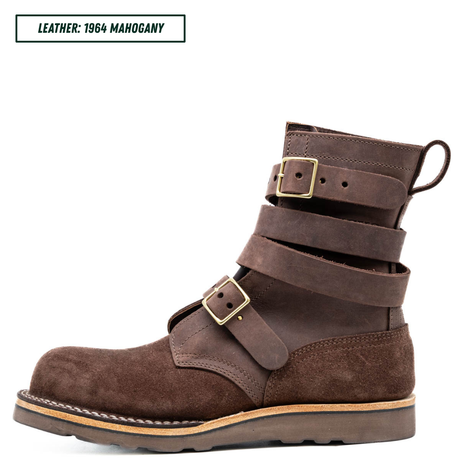 A dark brown leather ankle boot with multiple strap buckles, shown in profile against a white background. A text label in the top left reads 'LEATHER: 1964 MAHOGANY'.