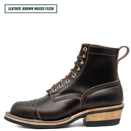 A dark brown waxed leather lace-up ankle boot with gold-tone metal eyelets and a stacked wood-look heel, shown in profile on a white background. A text label in the top-left corner reads 'LEATHER: BROWN WAXED FLESH'.