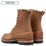 HD lace up build your own boots sitting together facing back left. Top reads 'LEATHER; 1964 TAN'.