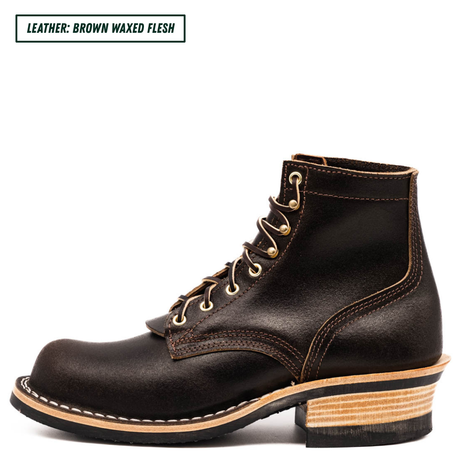 A dark brown leather lace-up boot with a stacked wood-look heel, shown in profile on a white background. A text label in the top-left corner reads 'LEATHER: BROWN WAXED FLESH'.
