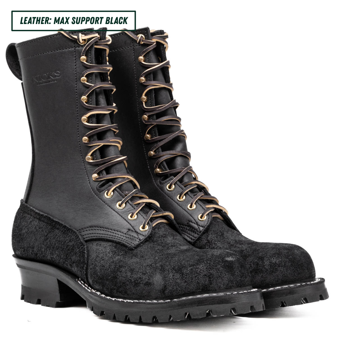 A pair of black leather and suede lace-up boots with gold-tone eyelets and black laces, shown on a white background with a text label in the top left corner.