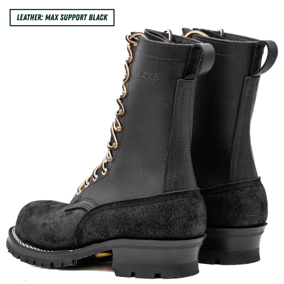 A pair of black leather lace-up boots shown from the side against a white background, with a text label in the top-left corner that reads 'LEATHER: MAX SUPPORT BLACK'.