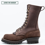 A dark brown leather lace-up boot shown in profile on a white background, with a text label in the top-left corner reading 'LEATHER: 1964 MAHOGANY'. The boot has gold-tone eyelets, a black sole, and the brand name 'NICKS' embossed on the side.