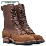 A pair of high-top lace-up boots in brown leather and suede, shown on a white background with a text label in the top left corner that reads 'LEATHER: 1964 BROWN'.