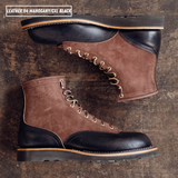 Two tone boots with dark brown roughout uppers and glossy black lowers laying on textured concrete. Top left reads 'LEATHER:64 MAHOGANY/CXL BLACK'