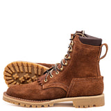 Shrunken bison brown leather Bear Slayer with brown padded collar, honey vibram outsole and 4 relief notches. Left boot sitting up with the right laying on its side showing the outsole.