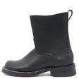 Black pull on boot on a white background. Black edge dressing white sole stitching 