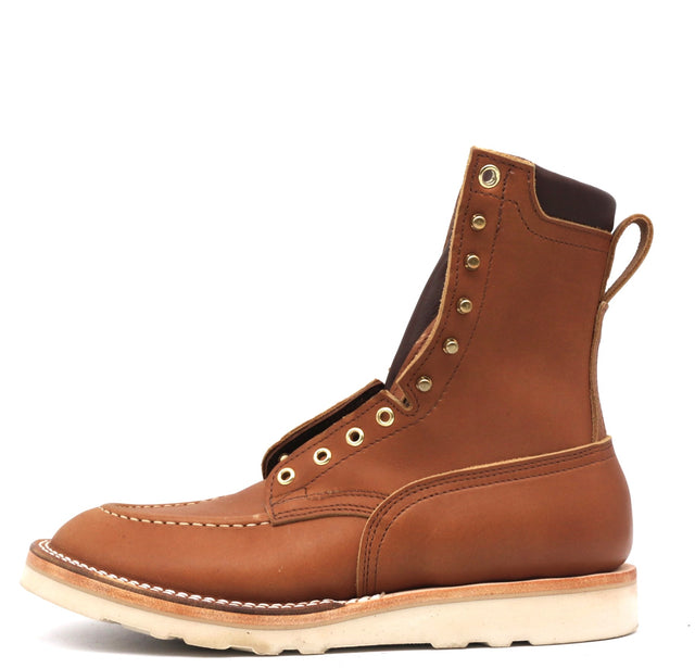 Brown leather boot with white sole on a white background