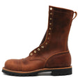 A brown leather lace-up work boot with brass eyelets, a pull loop, and a black lug sole, shown from a side profile on a white background.