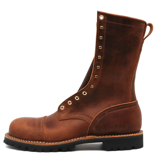 A brown leather lace-up work boot with brass eyelets, a pull loop, and a black lug sole, shown from a side profile on a white background.