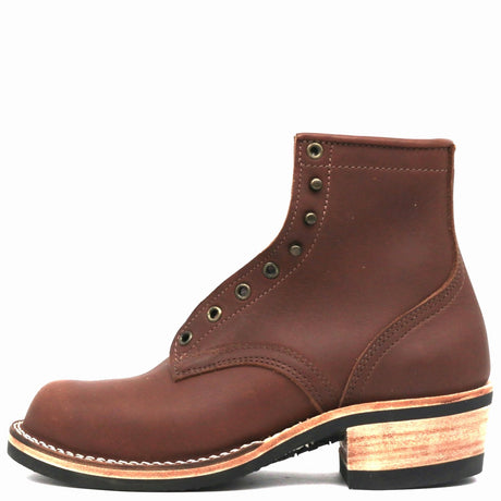 A brown leather lace-up ankle boot with a stacked wooden heel, black sole, and white welt stitching, shown from a side profile on a white background.