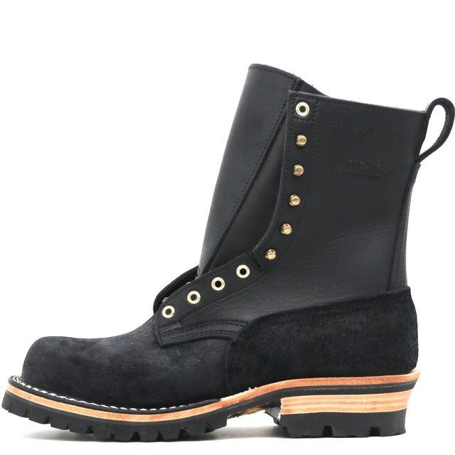 A black leather and suede lace-up work boot with gold-tone eyelets and a chunky lug sole, shown from a side profile on a white background.