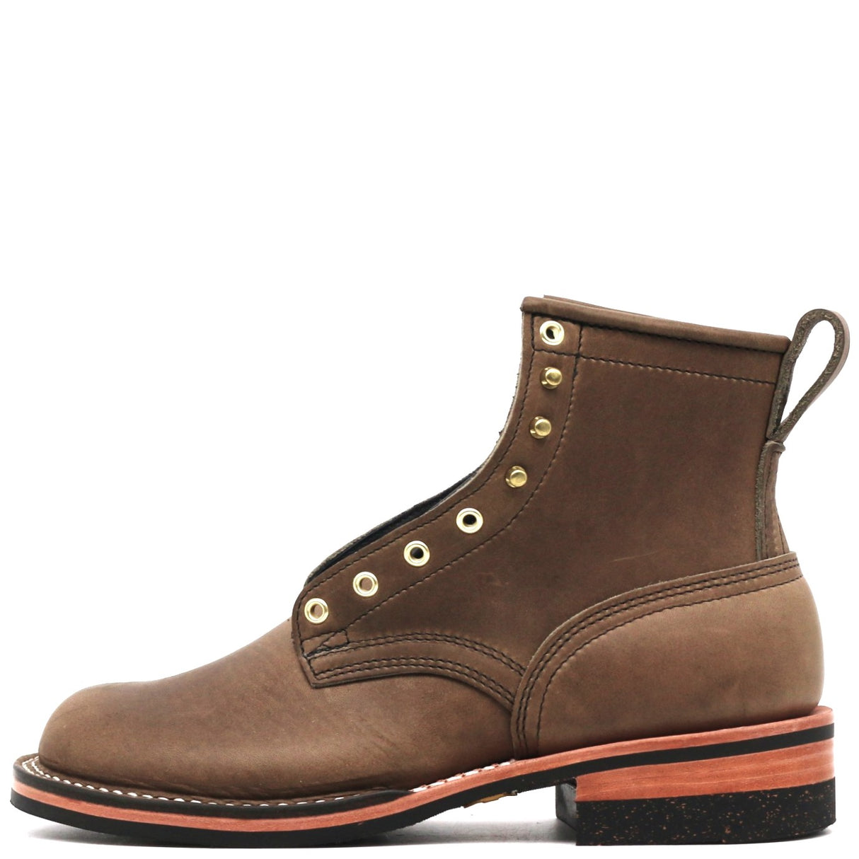 A brown suede lace-up ankle boot with brass eyelets, a pull tab, and a black sole with a copper-orange midsole layer, shown against a plain white background.
