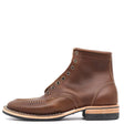 A brown leather lace-up ankle boot with a low stacked heel, stitched toe, and metal eyelets, shown in a side profile on a white background.