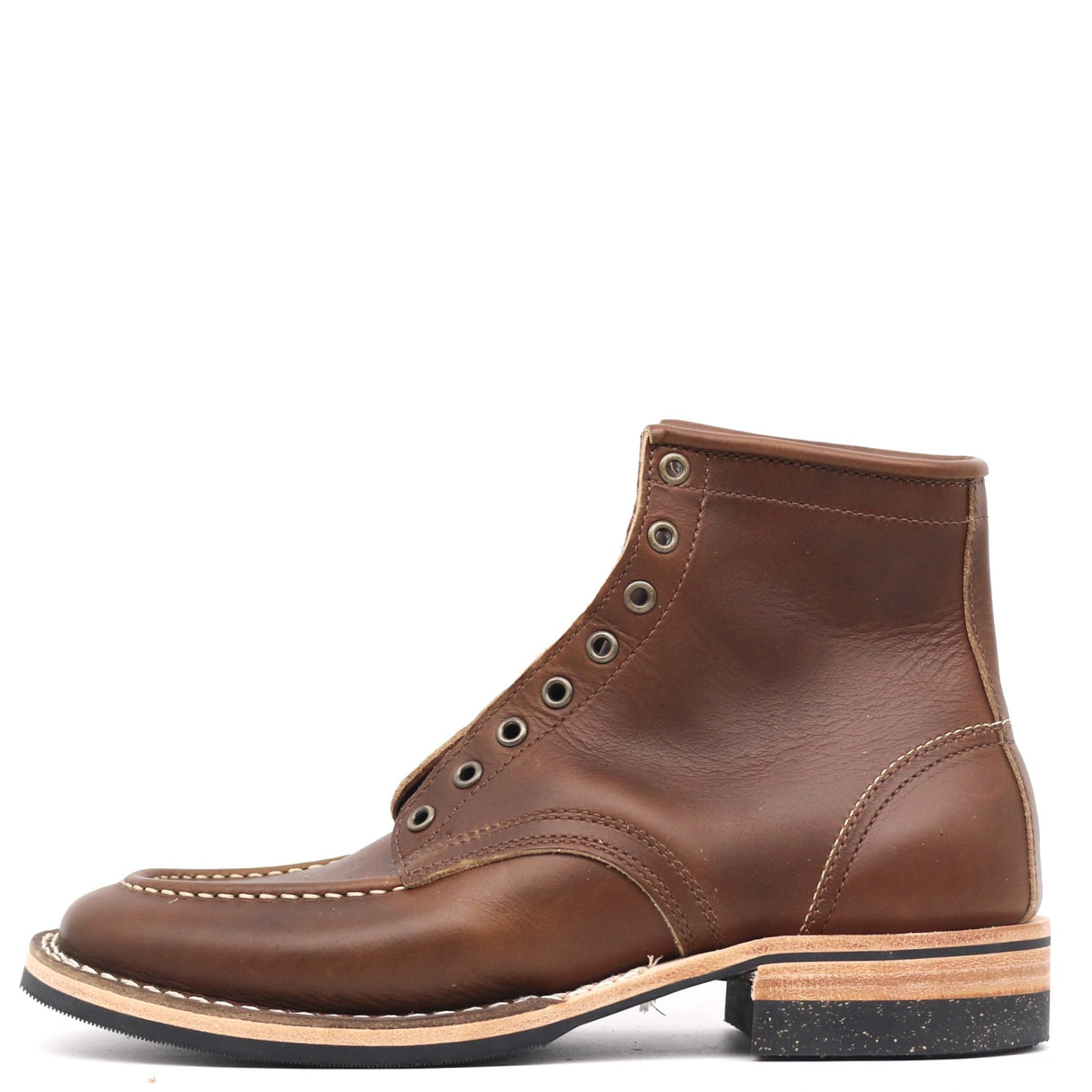 A brown leather lace-up ankle boot with a low stacked heel, stitched toe, and metal eyelets, shown in a side profile on a white background.