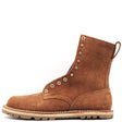 A brown suede lace-up ankle boot with brass eyelets and a thick lug sole, shown from a side profile on a white background.