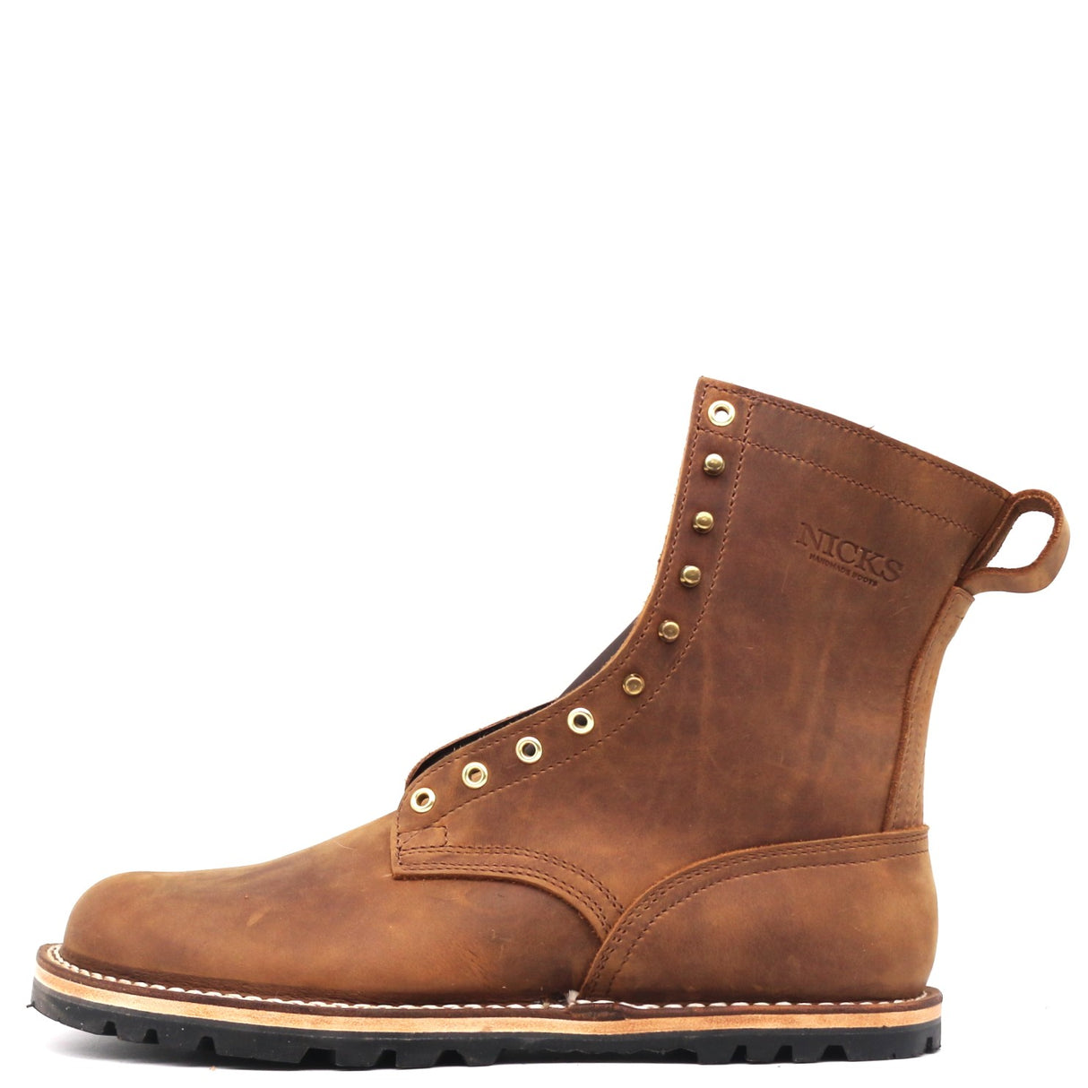 A brown leather lace-up boot with brass eyelets, decorative studs, and a pull tab, shown from a side profile on a white background.