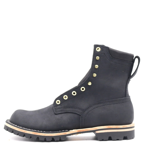 A black suede lace-up ankle boot with gold-tone metal eyelets and studs, a pull tab at the heel, and a rugged black lug sole with a light tan midsole stripe, shown against a plain white background.