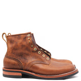 A pair of distressed brown leather ankle boots with brass eyelets and pull tabs, shown from a side profile view on a white background.