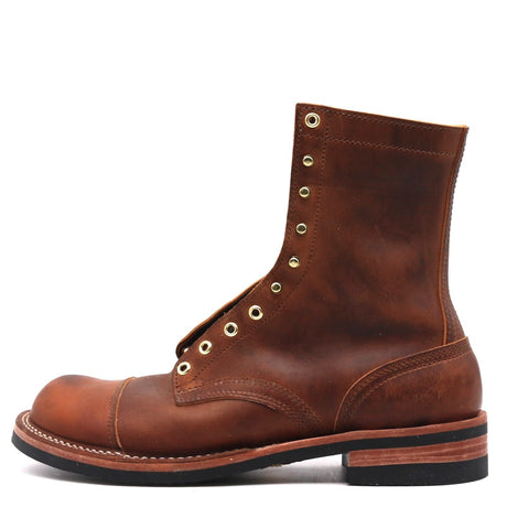 A brown leather lace-up boot with brass eyelets and a stacked sole, shown in a side profile on a white background.
