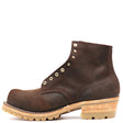 A dark brown leather lace-up ankle boot with brass eyelets, a stacked wood-look heel, and a light tan lug sole, shown from a side profile on a white background.
