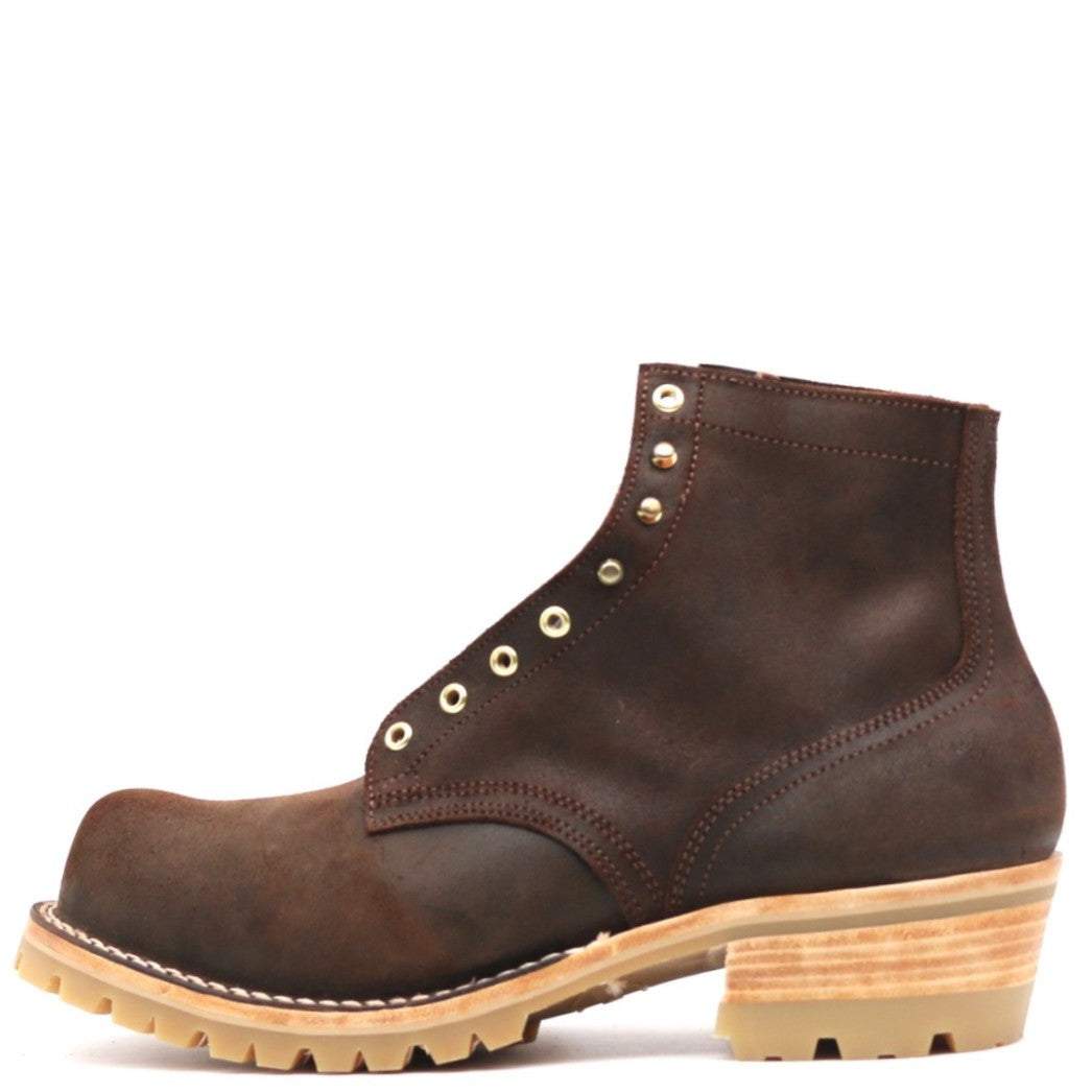A dark brown leather lace-up ankle boot with brass eyelets, a stacked wood-look heel, and a light tan lug sole, shown from a side profile on a white background.