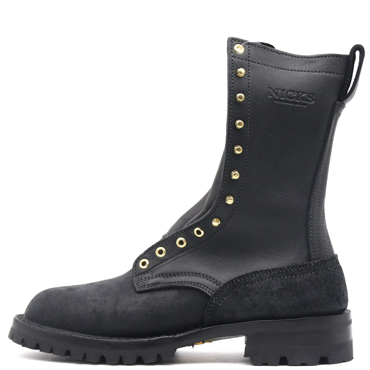 A black leather and suede lace-up boot with gold-tone metal eyelets and studs, featuring the embossed brand name 'NICKS' on the side, shown against a plain white background.