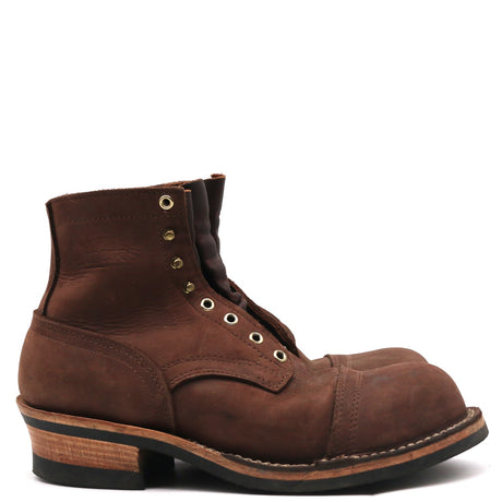 A brown leather lace-up ankle boot with a chunky stacked heel, black outsole, and brass eyelets, shown from a side profile on a white background.
