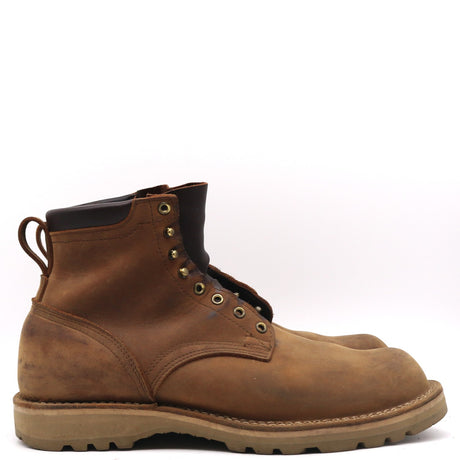 A single brown leather lace-up work boot with a pull tab, set against a plain white background.