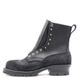 A black leather and suede lace-up ankle boot with gold-tone metal eyelets and studs, a pull tab, and a chunky lug sole, shown from a side profile on a white background.