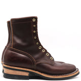 A dark brown leather lace-up ankle boot with brass eyelets, a stacked wood-look heel, and a black sole, shown from a side profile on a white background.