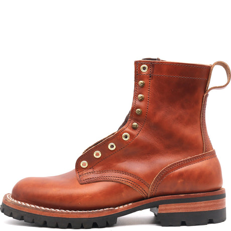 A single brown leather lace-up ankle boot with brass eyelets, a pull tab, and a black lug sole, shown in a side profile on a white background.