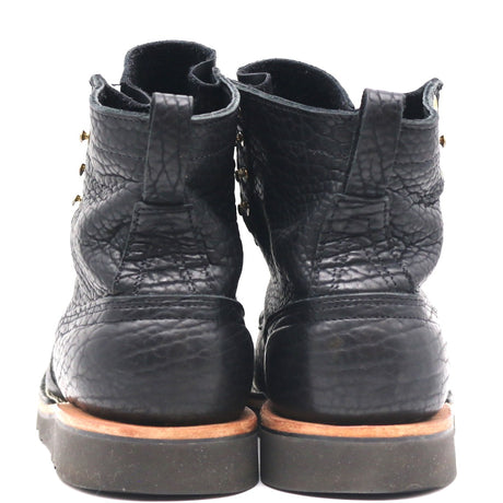 A pair of black leather ankle boots with a textured, cracked finish, shown from the back against a plain white background.