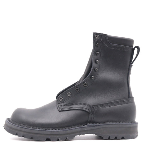 A single black leather ankle boot with a rugged sole, side pull tab, and decorative metal eyelets, shown from a side profile on a white background.