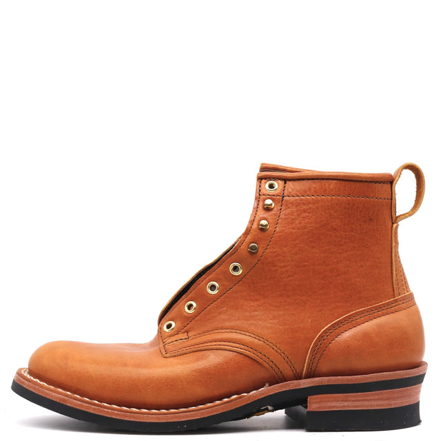 A single light brown leather ankle boot with brass eyelets, a pull tab, and a black sole, shown from a side profile on a white background.