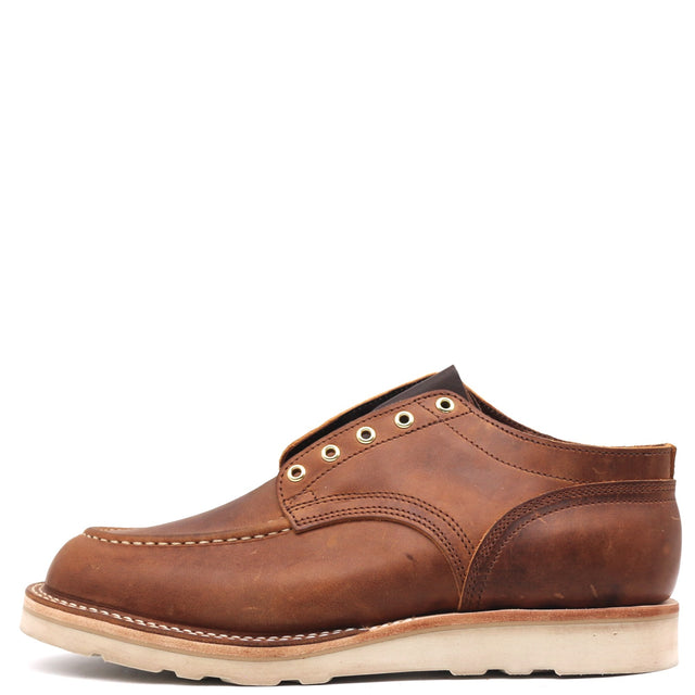 A brown leather lace-up shoe with a thick off-white sole, shown from a side profile view against a plain white background.